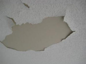 cracked or peeling paint on a ceiling