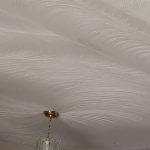 half moon swirl design on stipple ceiling