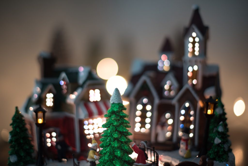 gingerbread house decorated with lights adds colour to home decor