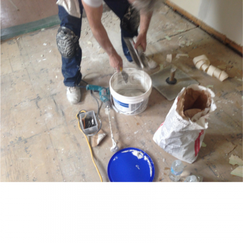 mixing of drywall compound to repair and patch walls and ceilings before painting
