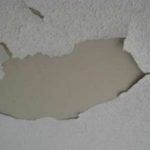 cracked peeling paint bubbles on ceiling drywall to be repaired before painting